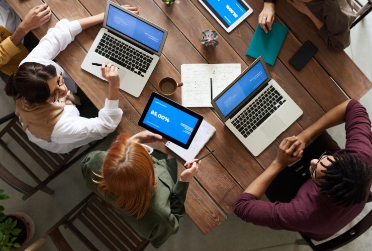 employees working around a table